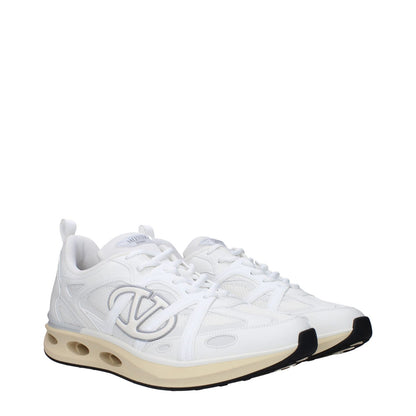Valentino Garavani White Fabric Athletic Sneakers with front, side, and back logos, lace-up closure, and rubber sole.