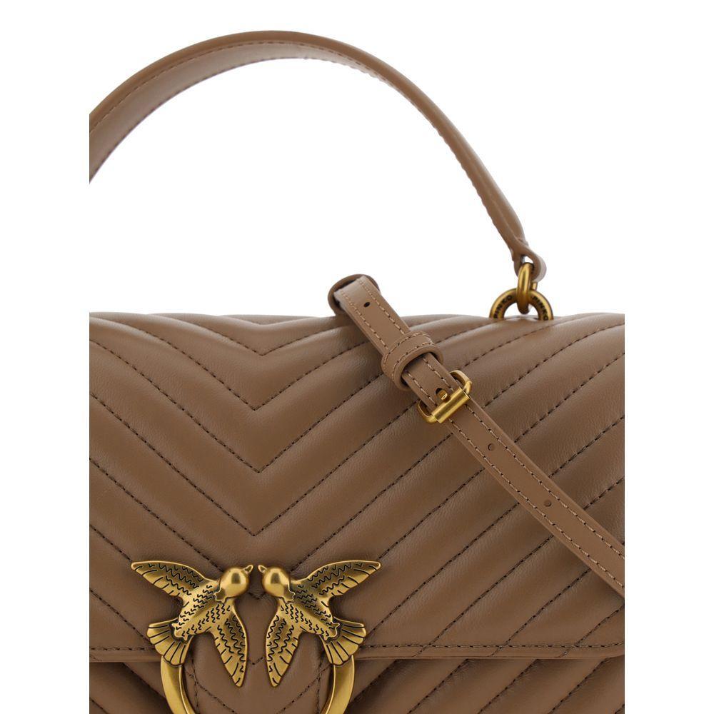 Front view with bag zipped and handles upright.