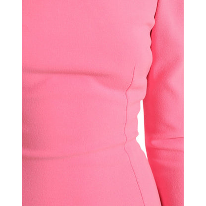 Dolce & Gabbana Pink Polyester Long Sleeves Sheath Midi Dress featuring smooth fabric and sleek silhouette close-up.