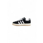 Adidas Black Suede Leather Sneaker featuring white stripes, classic design, and rubber sole for style and comfort.