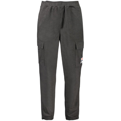 Fila Black Cotton Pant with elastic waist, side pockets, logo and elastic ankle, perfect for sports.