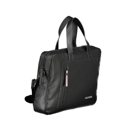 Tommy Hilfiger Black Polyester Accessory briefcase with handles and shoulder strap, featuring external pocket and laptop compartment.