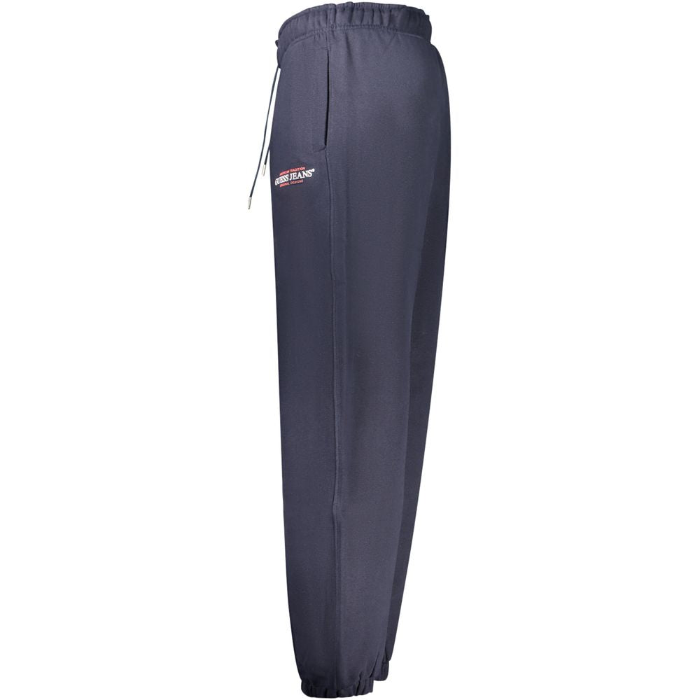 Guess Jeans Blue Cotton Pant, sports trousers with elastic waist and ankle, 3 pockets, logo print, fleece material, elastic laces.