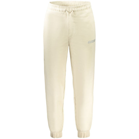 Guess Jeans Beige Cotton Pant with elastic waist, 3 pockets, side pocket, elastic ankle, contrasting details, and logo print.