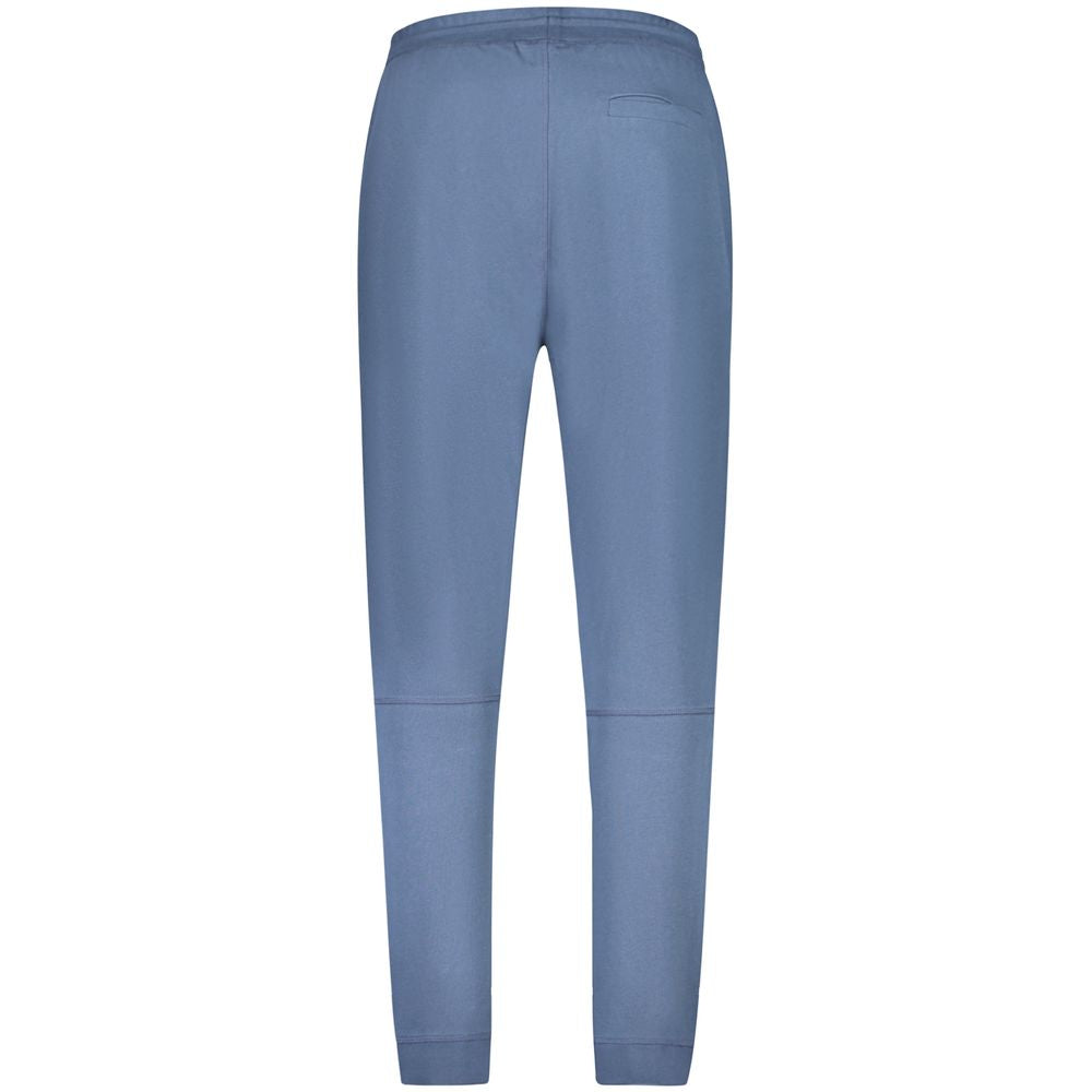 Hugo Boss Blue Cotton Pant with elastic waist, brushed fabric, three pockets, ankle cuff, and logo. Ideal sports trousers.