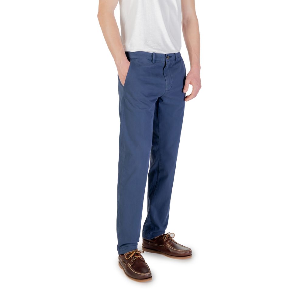 Man wearing Borghese Blue Cotton Skinny Pants, showcasing slim fit style suitable for casual and formal occasions.