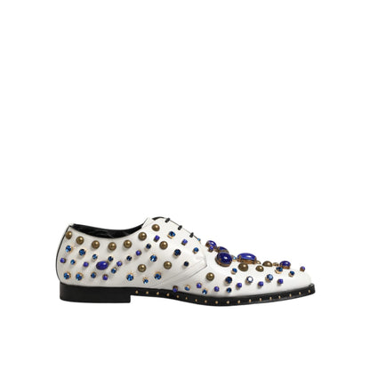 Dolce & Gabbana White Leather Crystals Embellished Dress Shoes with multicolor crystal details on a flat background