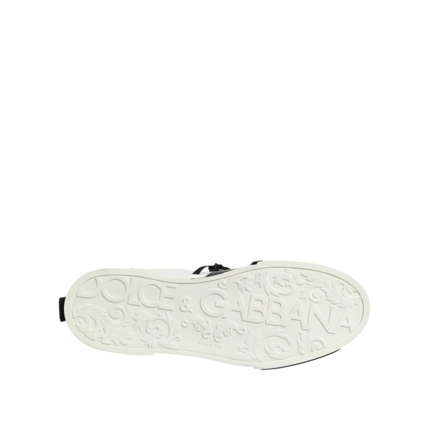 White sole of Dolce & Gabbana White Leather Logo Portofino Sneakers Shoes with embossed logo detailing.