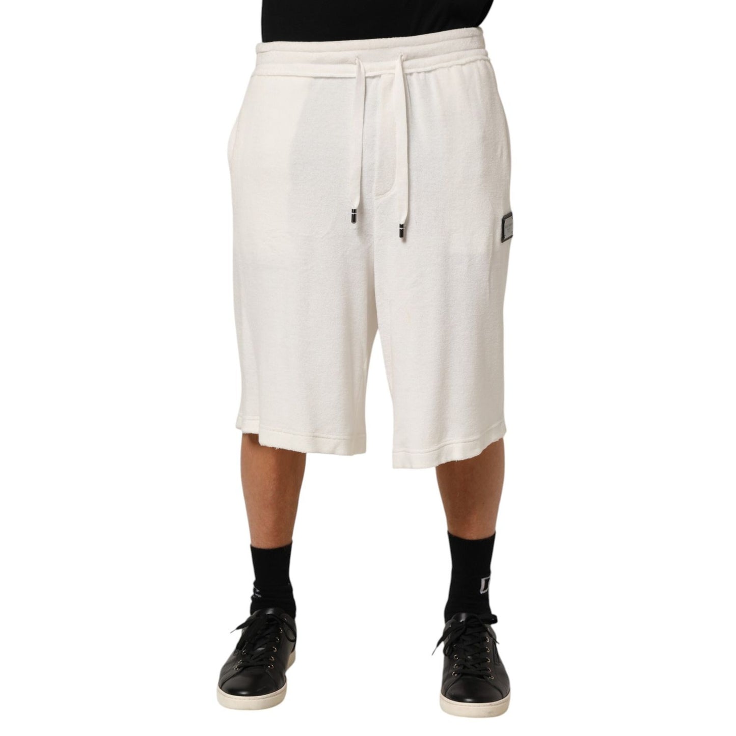 Dolce & Gabbana White Cotton Logo Plaque Men Bermuda Shorts with tailored fit and logo plaque for upscale casual or resort wear.