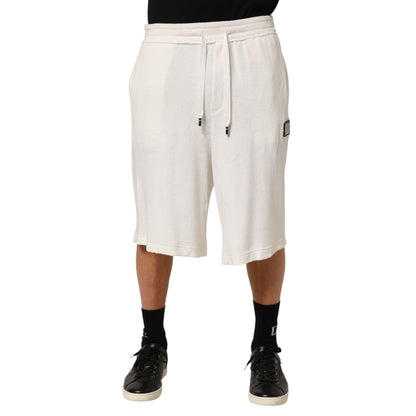 Dolce & Gabbana White Cotton Logo Plaque Men Bermuda Shorts with tailored fit and logo plaque for upscale casual or resort wear.