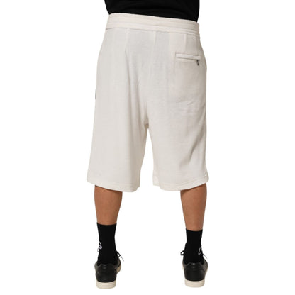 Back view of Dolce & Gabbana White Cotton Logo Plaque Men Bermuda Shorts showcasing tailored fit and subtle logo plaque.