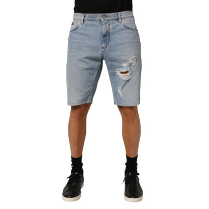 Dolce & Gabbana Blue Cotton Distressed Denim Bermuda Shorts with five-pocket styling and casual design
