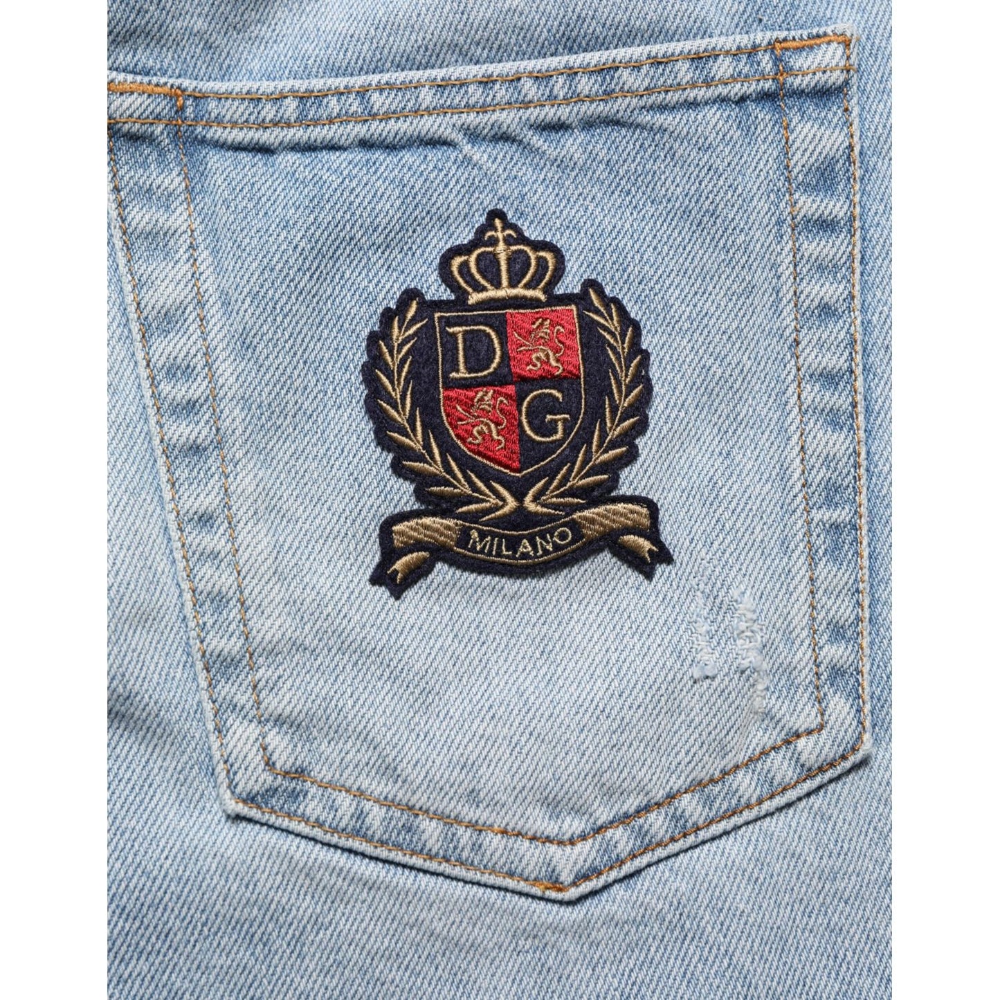 Dolce & Gabbana Blue Cotton Distressed Denim Bermuda Shorts with embroidered logo on back pocket