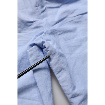 Close-up of Dolce & Gabbana Light Blue Linen Mid Waist Men Bermuda Shorts fabric detail