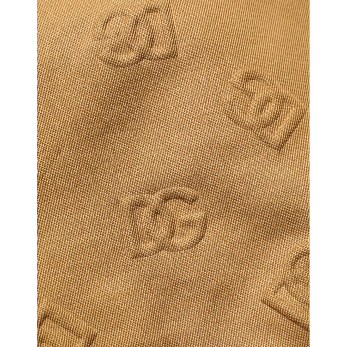 Close-up of Dolce & Gabbana Brown Cotton Stretch Logo CargoBermuda Shorts displaying embossed logo detail