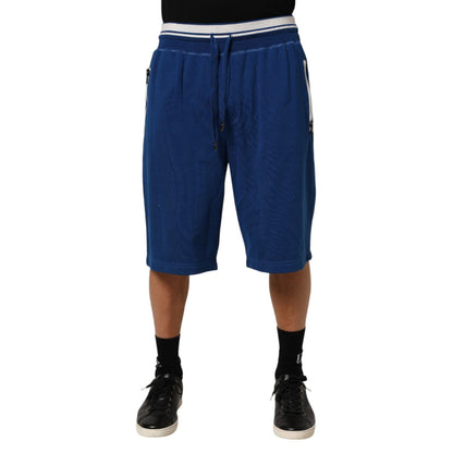 Dolce & Gabbana Blue Cotton Blend Bermuda Sweatpants Shorts with elastic waistband and drawstring for casual comfort and style.