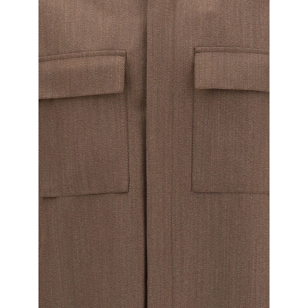 Close-up of ZEGNA Brown Wool Coat with classic collar and front flap welt pockets, highlighting tailoring details and wool texture.