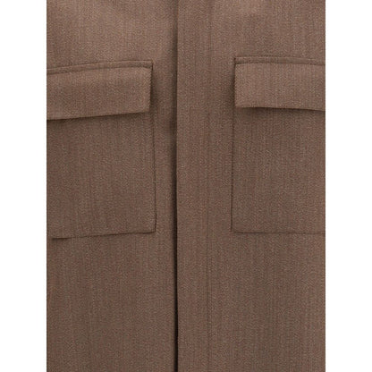 Close-up of ZEGNA Brown Wool Coat with classic collar and front flap welt pockets, highlighting tailoring details and wool texture.