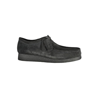 Clarks Black Leather Men Sneaker with suede finish, lace-up design, featuring iconic Clarks logo and removable footbed for comfort.