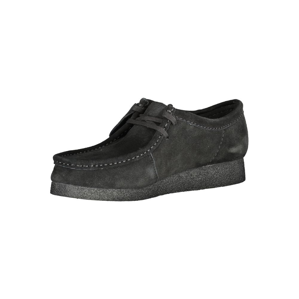 Clarks Black Leather Men Sneaker with suede finish and removable footbed, showcasing sleek design and iconic Clarks logo.