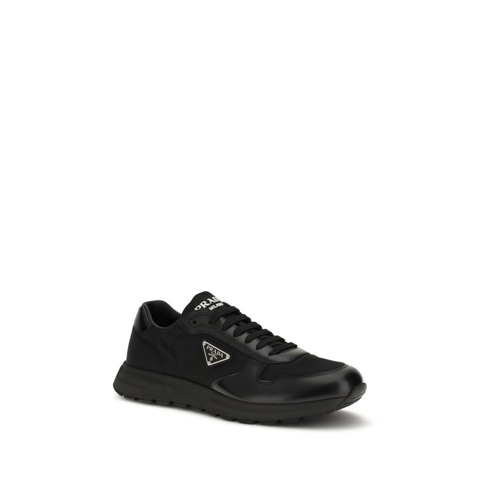 Prada Black Recycled Polyamide Athletic Sneakers with enameled logo and lightweight rubber sole for comfort and grip.