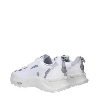 Valentino Garavani White Fabric Athletic Sneakers with logos and light grey accents, featuring lace-up design and round toe.