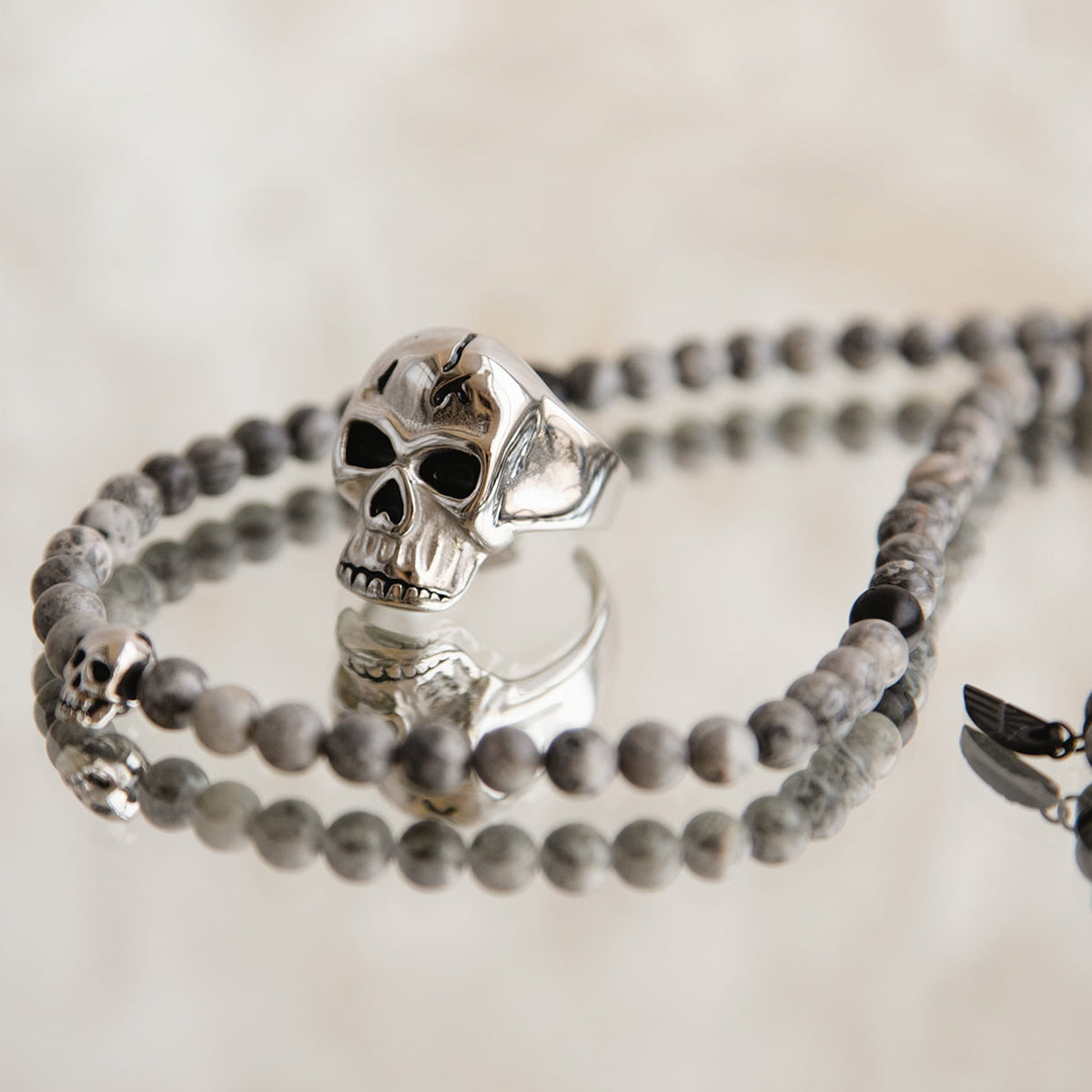 AN JEWELS JEWELRY Mod. AA.R255S-12 featuring skull design on beads and ring