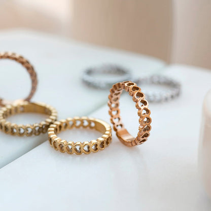 AN JEWELS JEWELRY Mod. AL.RSC01SYR-7 featuring elegant rings on a marble surface.