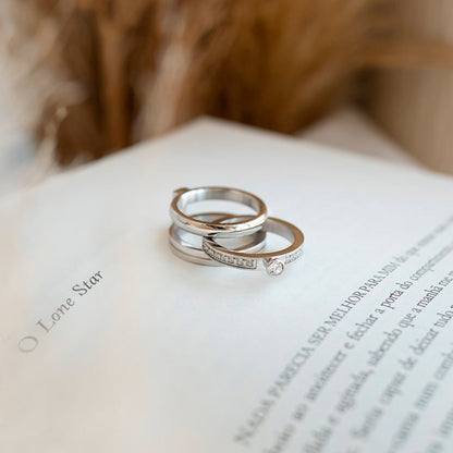 AN JEWELS JEWELRY Mod. AR.R1NS01SC-9 elegant silver rings on a book page