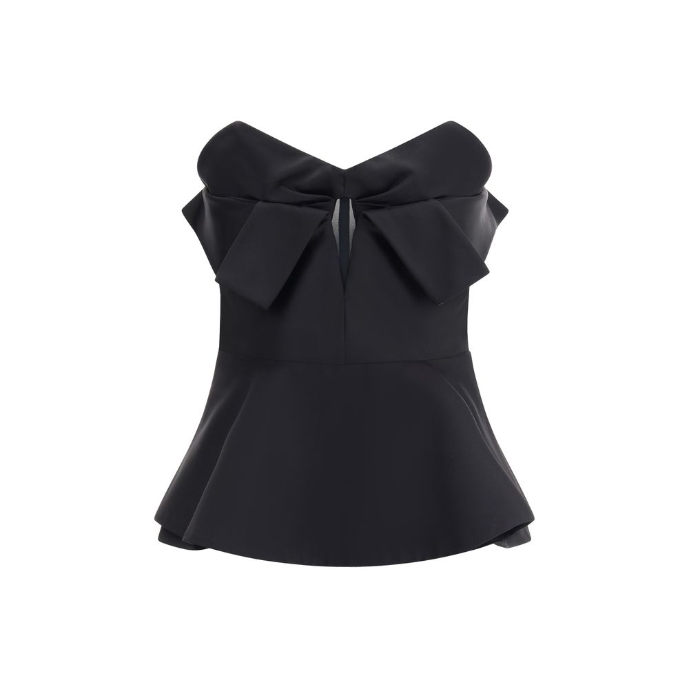 Alexander McQueen Black Polyester Top with bow neckline and peplum, sleeveless corset design, AW25 collection back view.