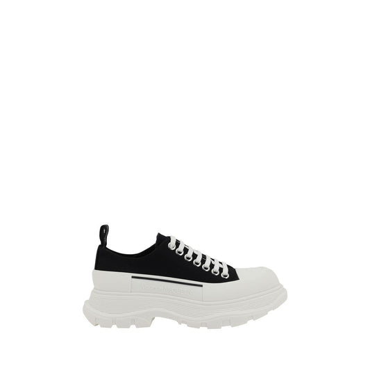 Alexander McQueen Black Rubber Chunky Sneakers with reinforced round toe and contrasting platform sole.