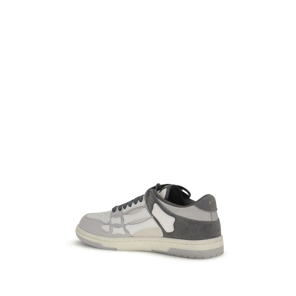 Amiri Gray Calf Leather Bos Taurus Low Top Sneakers with bone-shaped appliqués, side view.