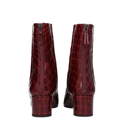 Rear view of Aquazzura Red Leather Ankle Boots with crocodile print and zip closure.