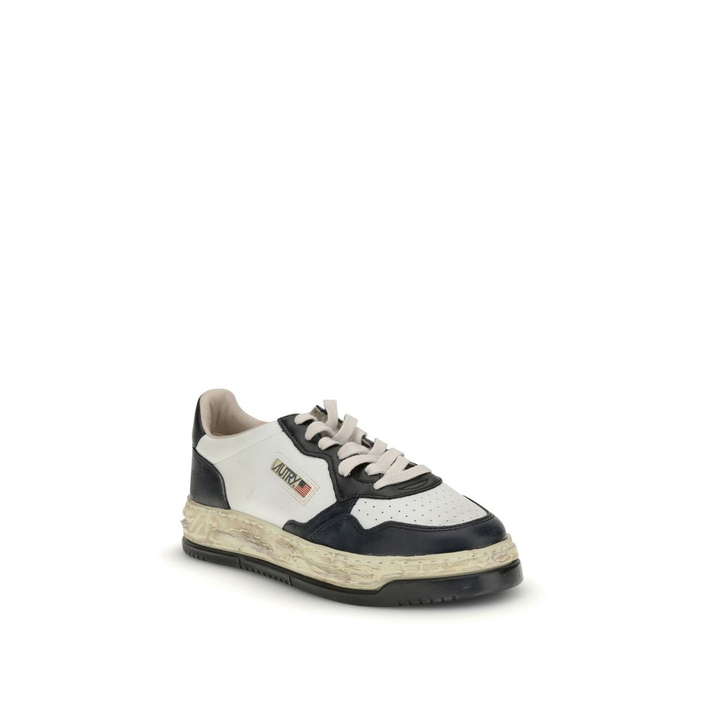 Autry Cream Leather Athletic Sneakers featuring white and black leather, perforated toe, and vintage midsole from Medalist x Mihara collection.