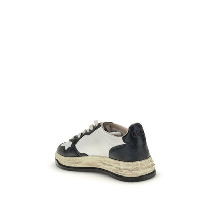 Autry Cream Leather Athletic Sneakers with black and white leather, vintage-textured midsole, and embossed heel tab