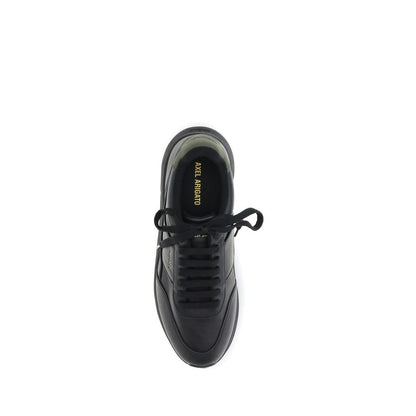 Top view of Axel Arigato Black Leather Athletic Sneakers showcasing sleek design and gold-stamped logo.