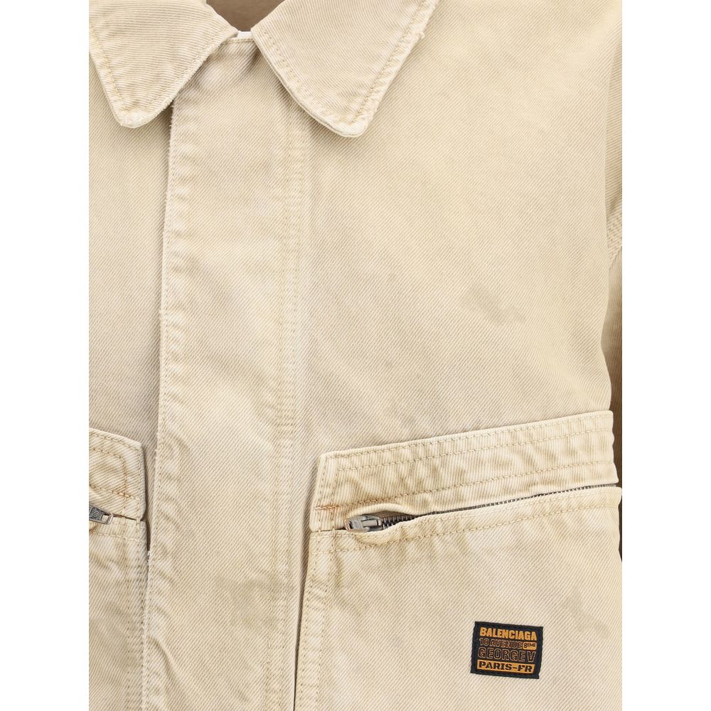 Balenciaga Beige Cotton Denim Jacket with classic collar and zipper front, featuring zippered patch pockets and mini logo patch.