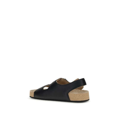Balenciaga Black Calf Leather Bos Taurus Flat Sandals with cork-lined sole, back view showing adjustable straps and ergonomic design.
