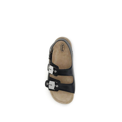 Balenciaga Black Calf Leather Bos Taurus Flat Sandals with ergonomic cork insole and metal buckles, top view.