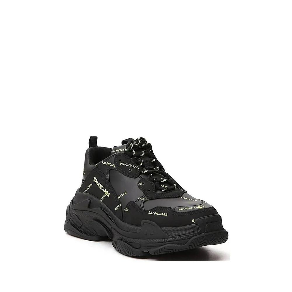 Balenciaga Black Calfskin Chunky Sneakers with logo detail, front lace-up closure, rubber sole, and round toe design for men.
