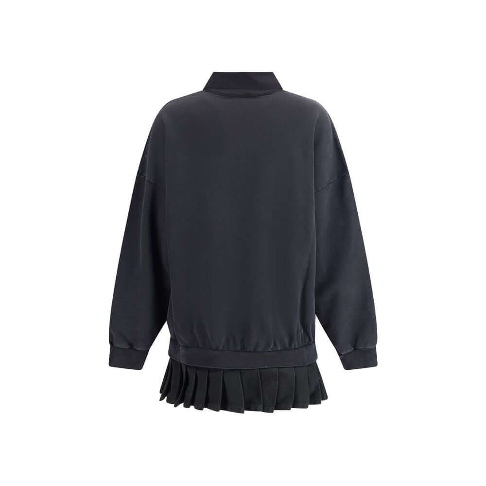 Back view of Balenciaga Black Cotton Casual Dress with pleated skirt and ribbed cuffs for AW25 collection.