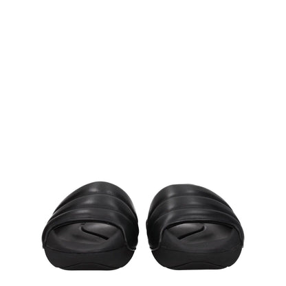 Alt Tag: Balmain Black Leather Slippers with mid heels and side logo, featuring open toe design, crafted from black leather with rubber sole.