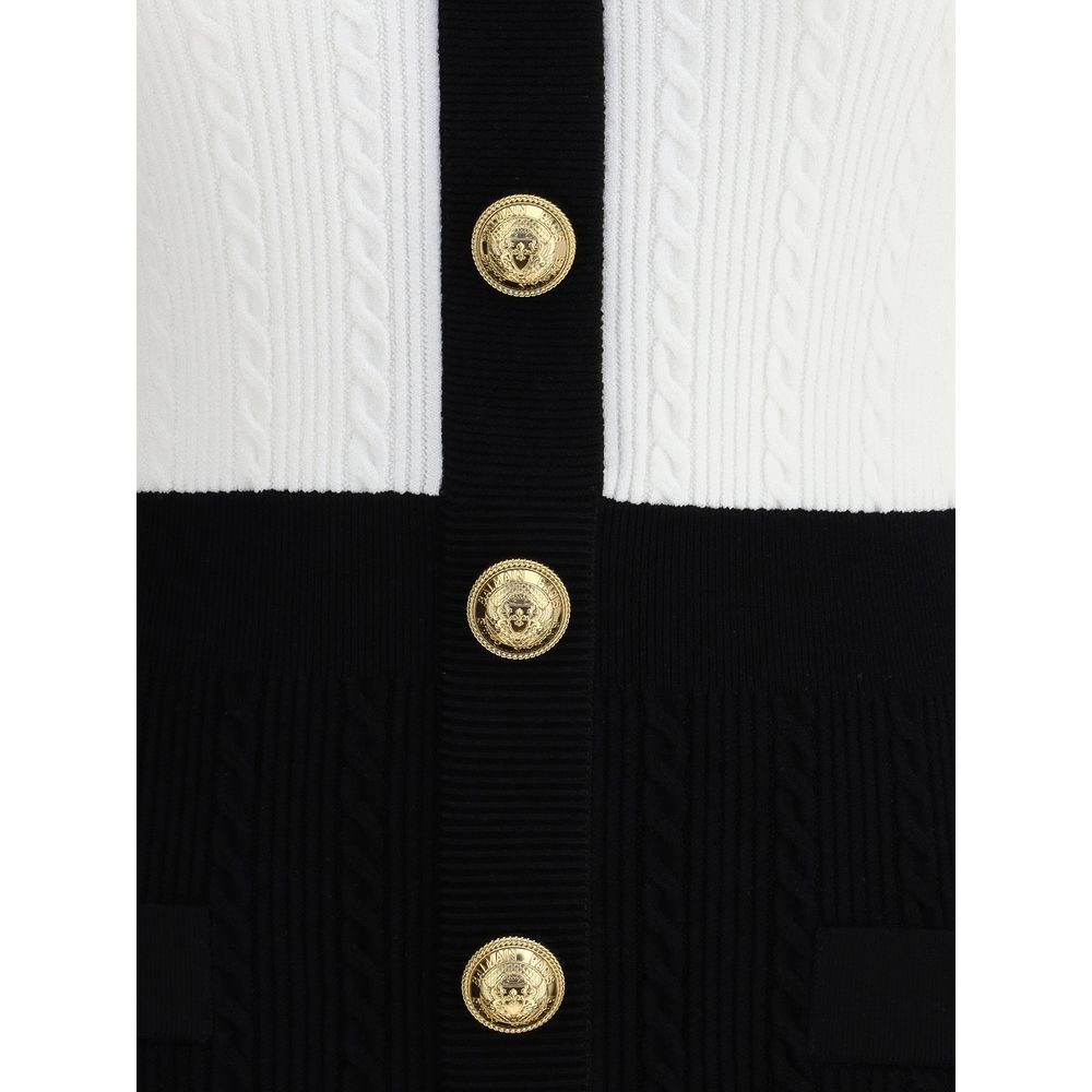 Close-up of Balmain Multicolor Viscose Casual Dress with gold embossed buttons and braided pattern detail.