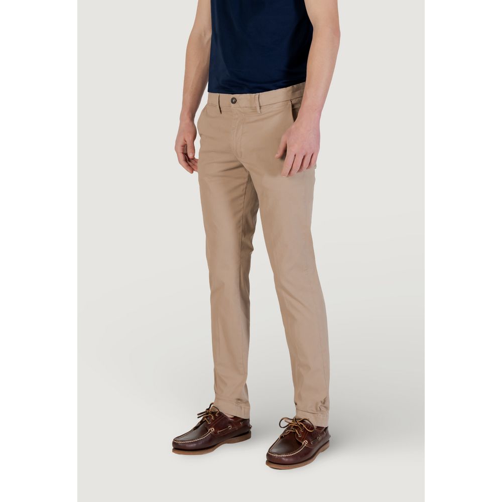 Model wearing Borghese Beige Cotton Skinny Pants with slim-fit design, perfect for everyday wear and versatile occasions.