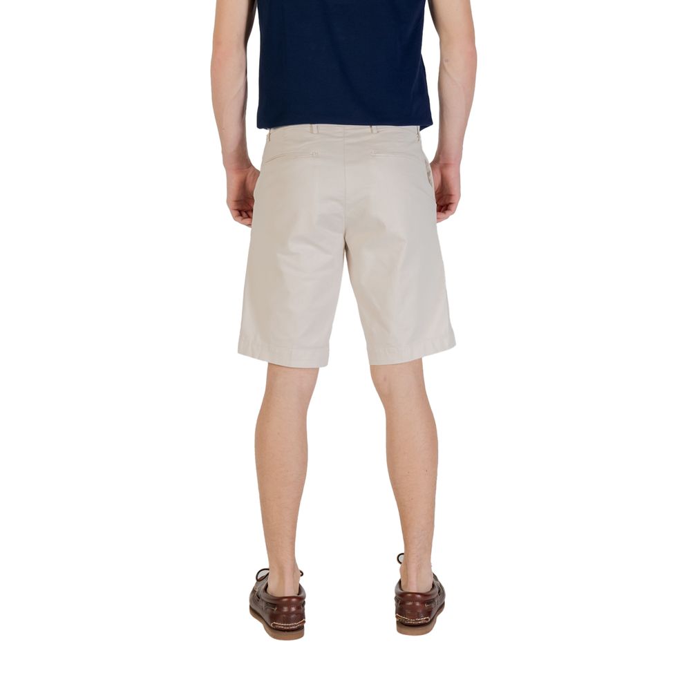 Back view of Borghese Bicolor Cotton Bermuda Shorts worn by man, showcasing versatile and stylish summer fashion.