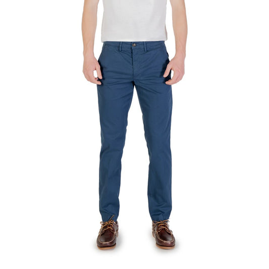 Man wearing Borghese Blue Cotton Skinny Pants with brown shoes and a white shirt showcasing slim fit design.
