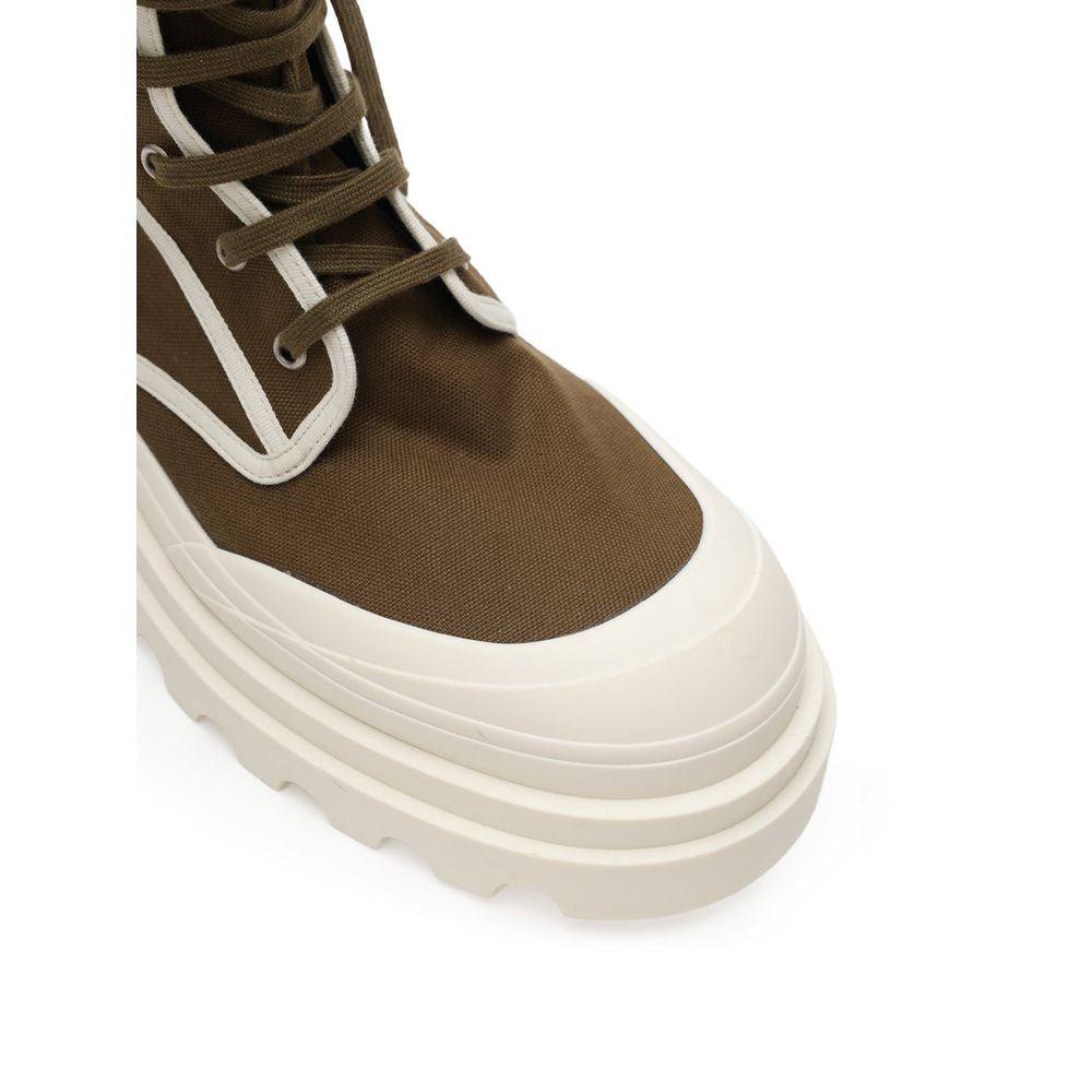 Close-up of Bottega Veneta Green Cotton Lace-Up Boots with khaki canvas and white rubber outsole.