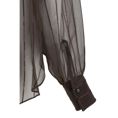 Detail of Brunello Cucinelli Brown Silk Blouse showcasing semi-transparent fabric and adjustable button cuffs with sequin embellishments.