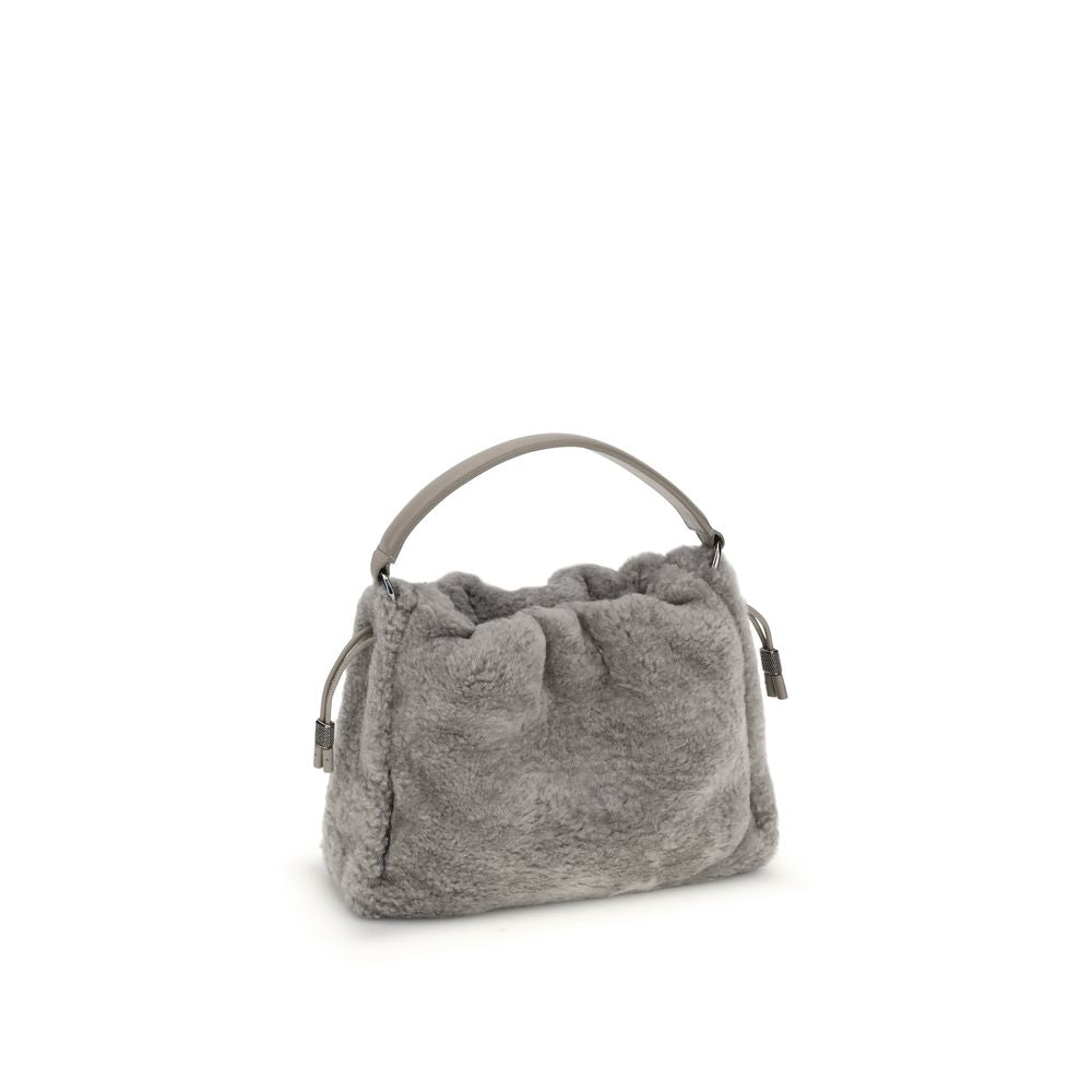 Brunello Cucinelli Gray Fur Shoulder Bag with soft shearling, drawstring closure, and leather lining. Elegant design for AW25 season.