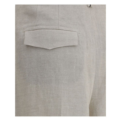 Detail of back flap pocket on Brunello Cucinelli Linen Pants highlighting luxe lamé weave and elegant craftsmanship.